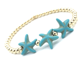 Armband Keet met turquoise zeesterretjes en real gold plated balletjes