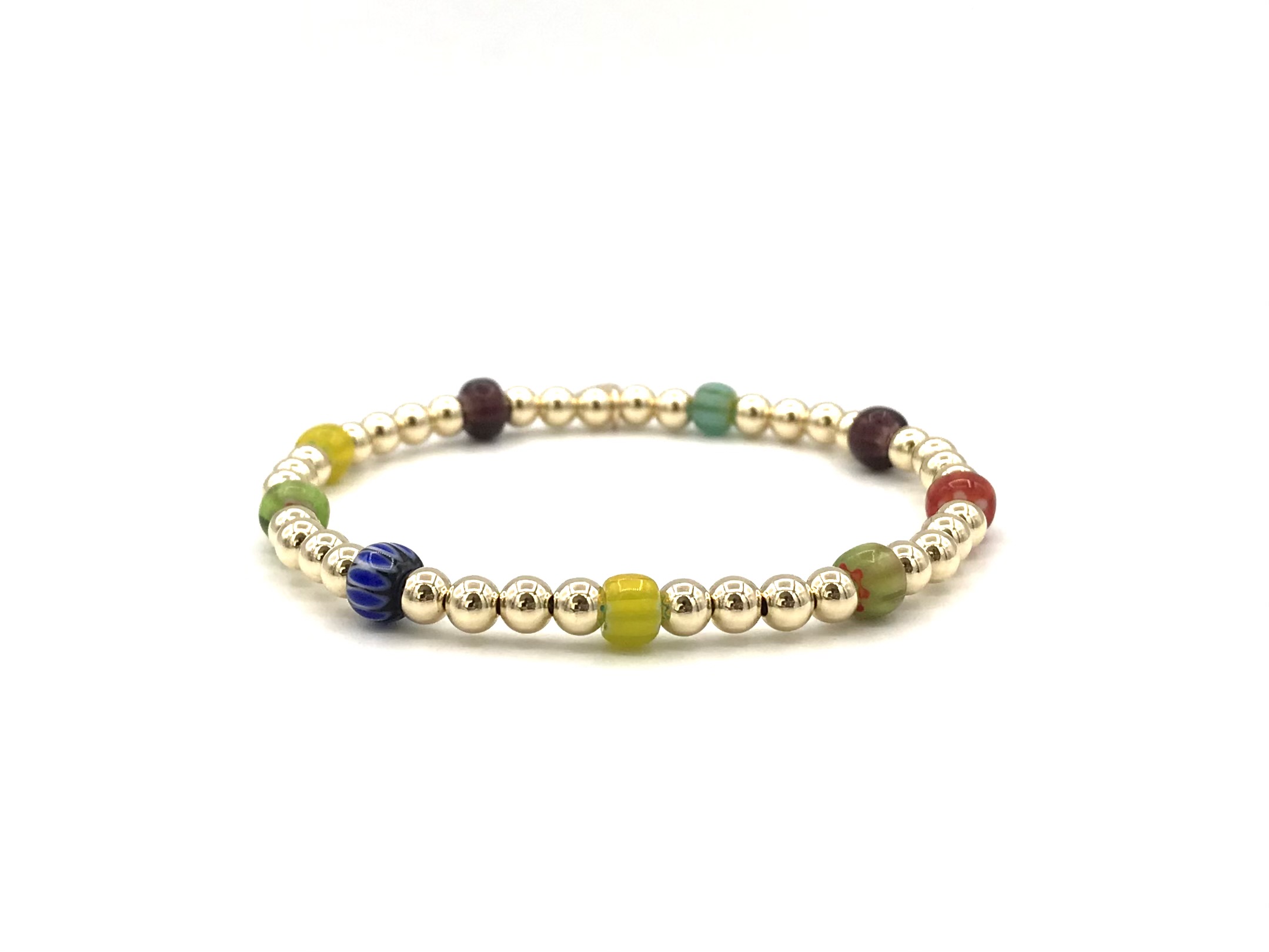 Armband Shanaya met real gold plated balletjes en gekleurde wieltjes.
