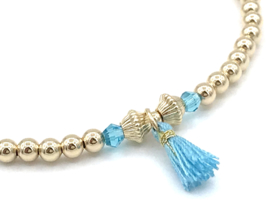 Armband Zoey met real gold plated balletjes, crystal en turquoise kwastje