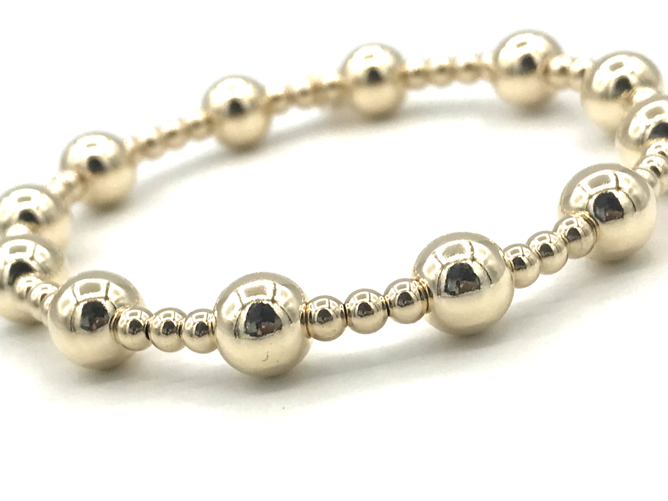 Armband Roxanne met real gold plated balletjes in verschillende groottes