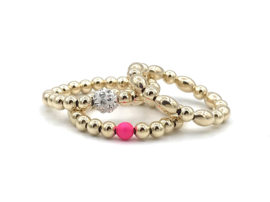 Stretch ring Selin met real gold plated balletjes en roze Swarovski parel