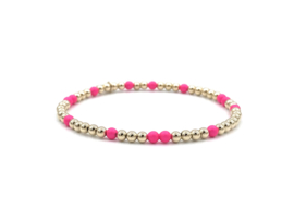 Armband Mirte met real gold plated balletjes en neon roze Swarovski pareltjes