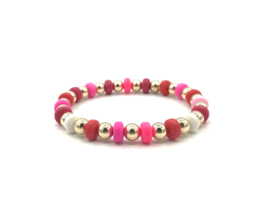 Armband Alisha pink/red  met gekleurde wieltjes en real gold plated balletjes