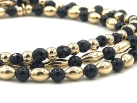 Armband Kaat met ovale real gold plated balletjes en zwarte onyx edelstenen