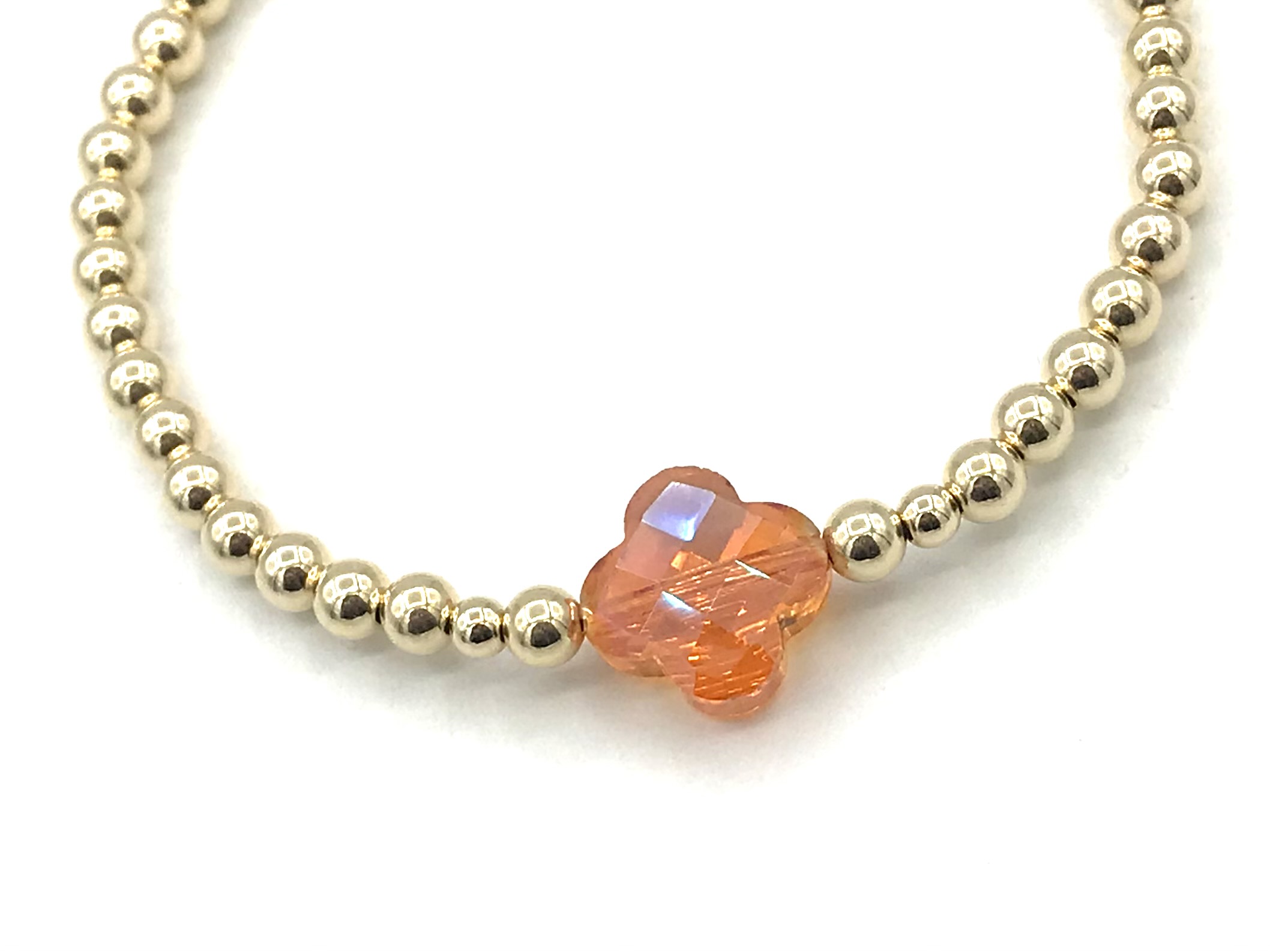 Armband Rabia orange met real gold plated bolletjes en oranje klavertje