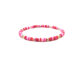 Armband Celine met real gold plated balletjes en roze en rode schijfjes