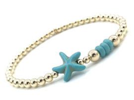 Armband Liza met turquoise zeester en real gold plated balletjes