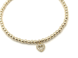 Armband Lilla met real gold plated balletjes en hartje met zirkonia