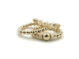 Stretch ring Jaelynn met real gold plated geribbelde wieltjes en balletjes