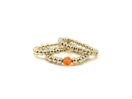 Stretch ring Azra met real gold plated balletjes en oranje Swarovski crystal
