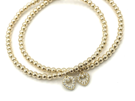 Armband Lilla met real gold plated balletjes en hartje met zirkonia