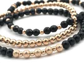 Armband Elize met rosé real gold plated balletjes en onyx edelsteen