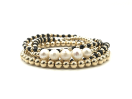 Armband Milana met real gold plated balletjes en zwarte schijfjes