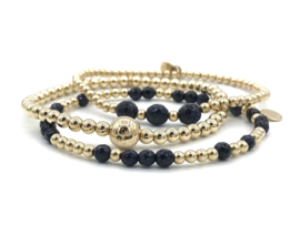 Armband Nine met real gold plated balletjes en donkerblauw goudsteen