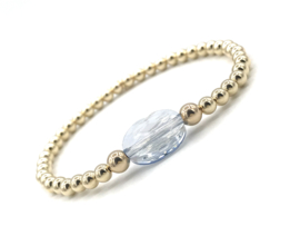 Armband Maya met licht blauw Swarovski crystal en real gold plated balletjes