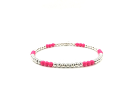 Armband Novi met Sterling zilveren balletjes en neon roze Swarovski pareltjes