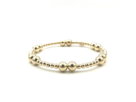 Armband Antonia met real gold plated balletjes in verschillende groottes.