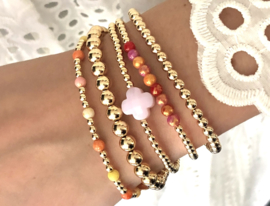 Armband Jalou met real gold plated balletjes en roze klavertje