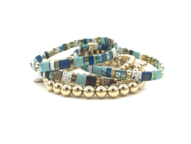 Armband Tila sparkle V met gold plated balletjes en edelsteen