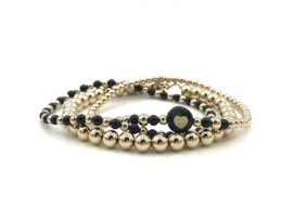 Armband Sienna met real gold plated balletjes en hartje van zwart parelmoer