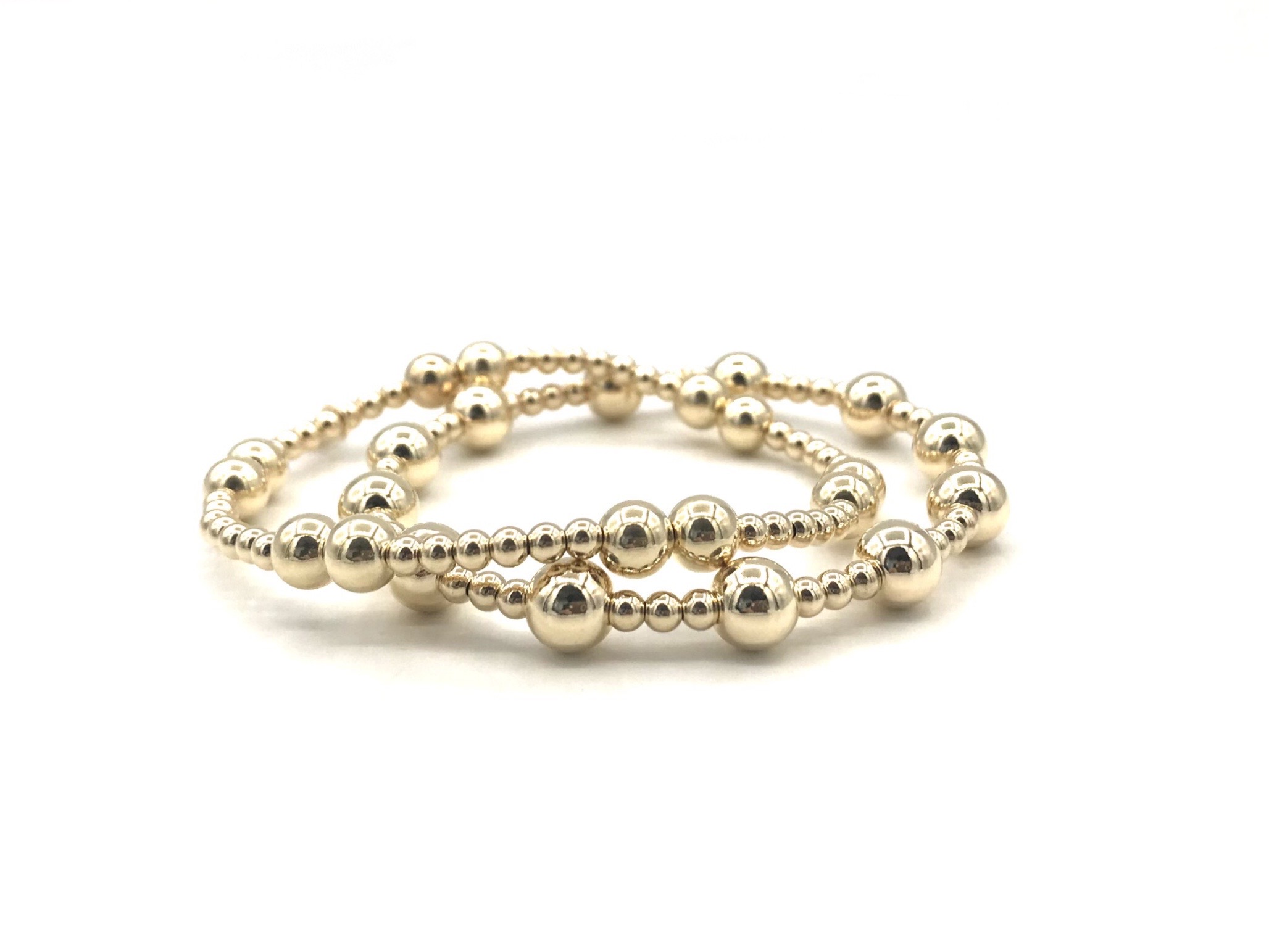 Armband Antonia met real gold plated balletjes in verschillende groottes.