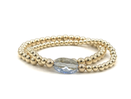 Armband Maya met licht blauw Swarovski crystal en real gold plated balletjes
