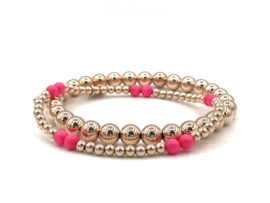 Armband Milena met rosé real gold plated balletjes en neon roze Swarovski pareltjes