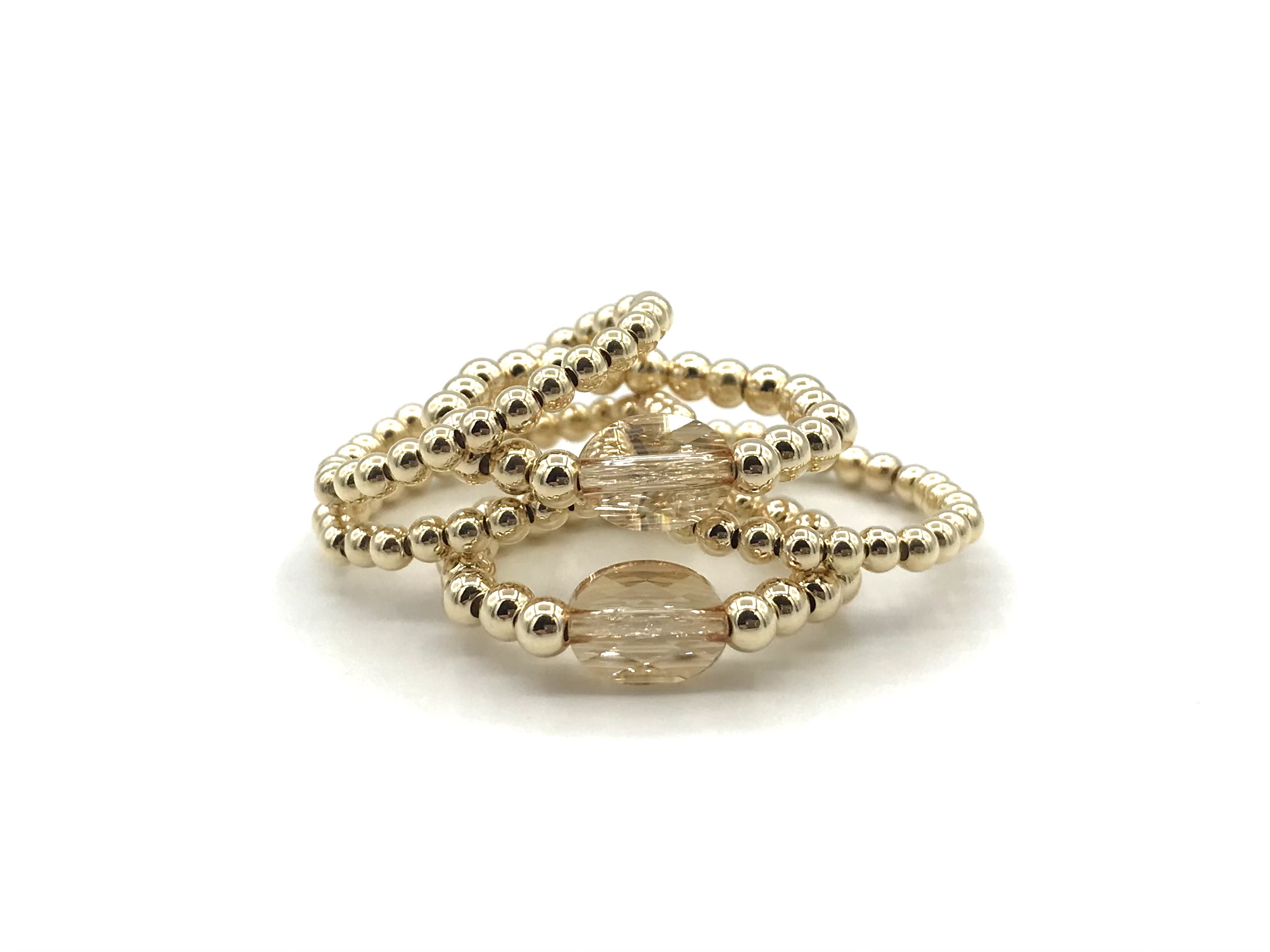 Stretch ring Merle met champagne kleurig Swarovski crystal en real gold plated balletjes
