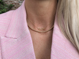 Goudkleurige infinity ketting met hartje