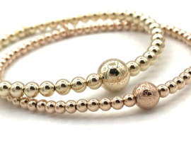 Armband Aya met rosé real gold plated balletjes en glitterbal