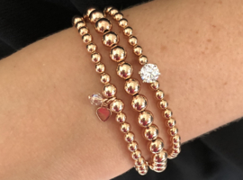 Armband Mae met rosé real gold plated balletjes, hartje en Swarovski crystal