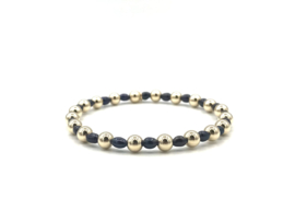 Armband Tatum met real gold plated balletjes en zwarte ovale pareltjes
