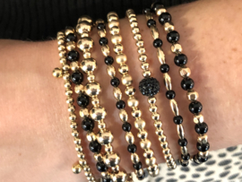 Armband Kaylee met ovale real gold plated balletjes en zwarte onyx edelstenen