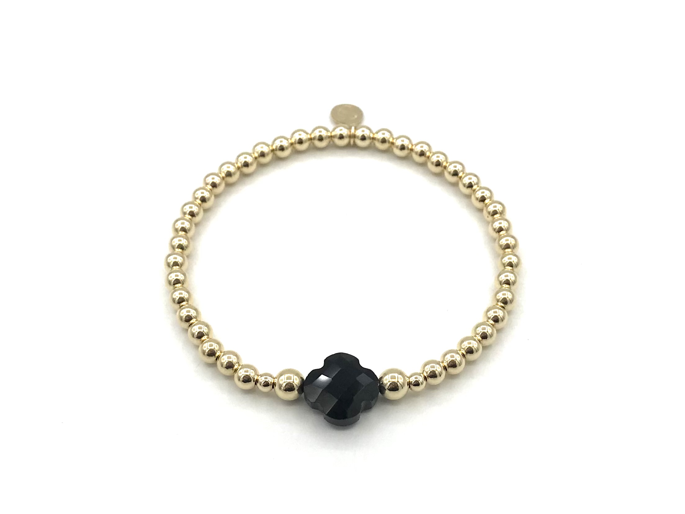 Armband Lizzie black met goudkleurige real gold plated balletjes en zwart klavertje