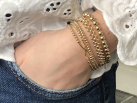 Armband Aisha met real gold plated balletjes en cross tube spacer