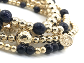 Armband Nine met real gold plated balletjes en donkerblauw goudsteen