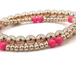 Armband Milena met rosé real gold plated balletjes en neon roze Swarovski pareltjes