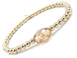 Armband Ela met real gold plated balletjes en champagne kleurig klavertje