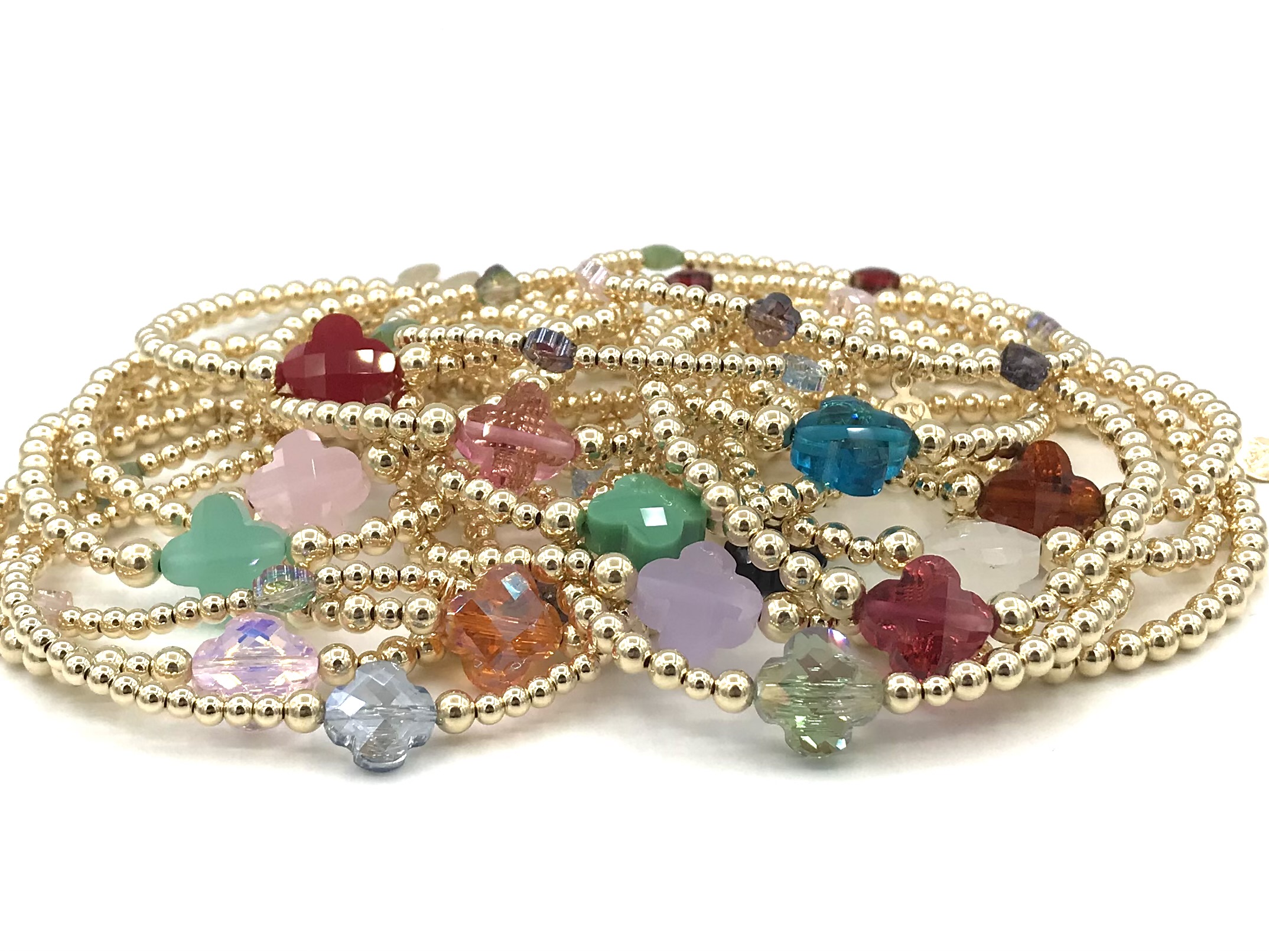 Armband Lizzie aqua met goudkleurige real gold plated balletjes en blauw klavertje