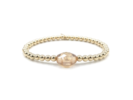 Armband Ela met real gold plated balletjes en champagne kleurig klavertje