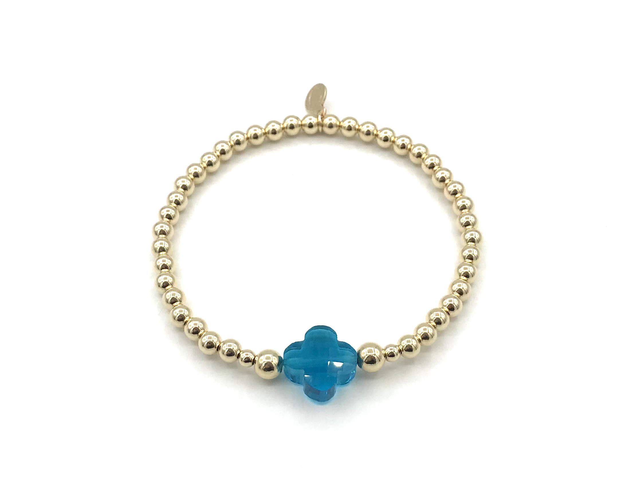 Armband Lizzie aqua met goudkleurige real gold plated balletjes en blauw klavertje