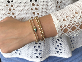 Armband Scarabee met real gold plated balletjes en gelukskever van Swarovski crystal