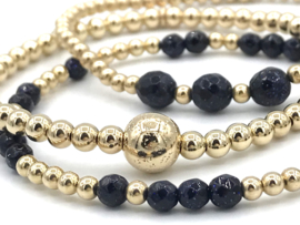 Armband Nine met real gold plated balletjes en donkerblauw goudsteen