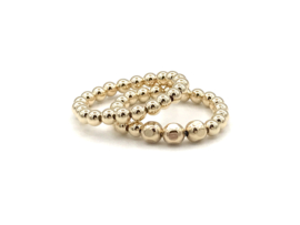 Stretch ring Jette met ronde en facet real gold plated balletjes