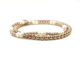 Armband Mina met rosé real gold plated balletjes en witte zoetwaterparels