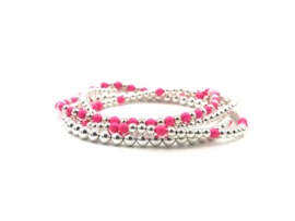 Armband Novi met Sterling zilveren balletjes en neon roze Swarovski pareltjes