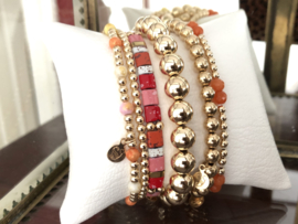 Armband Tila pink met gold plated balletjes en edelsteen