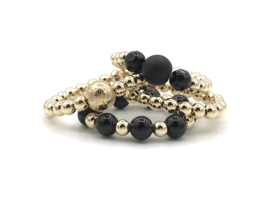 Stretch ring Cato met real gold plated balletjes en zwarte onyx edelsteen