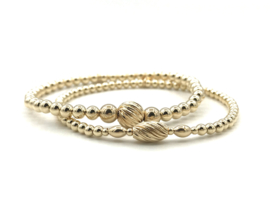 Armband Alyssa met ovale twisted bal en real gold plated balletjes