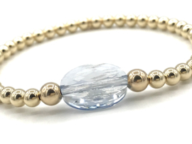 Armband Maya met licht blauw Swarovski crystal en real gold plated balletjes